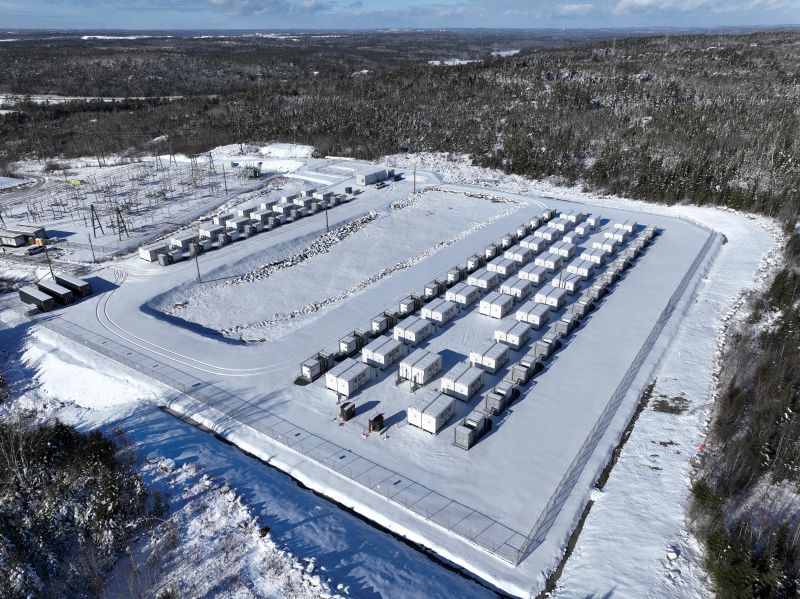 Waverly Gride-Scale Battery Site consisting of grid batteries in a winter landscape covered with snow all over