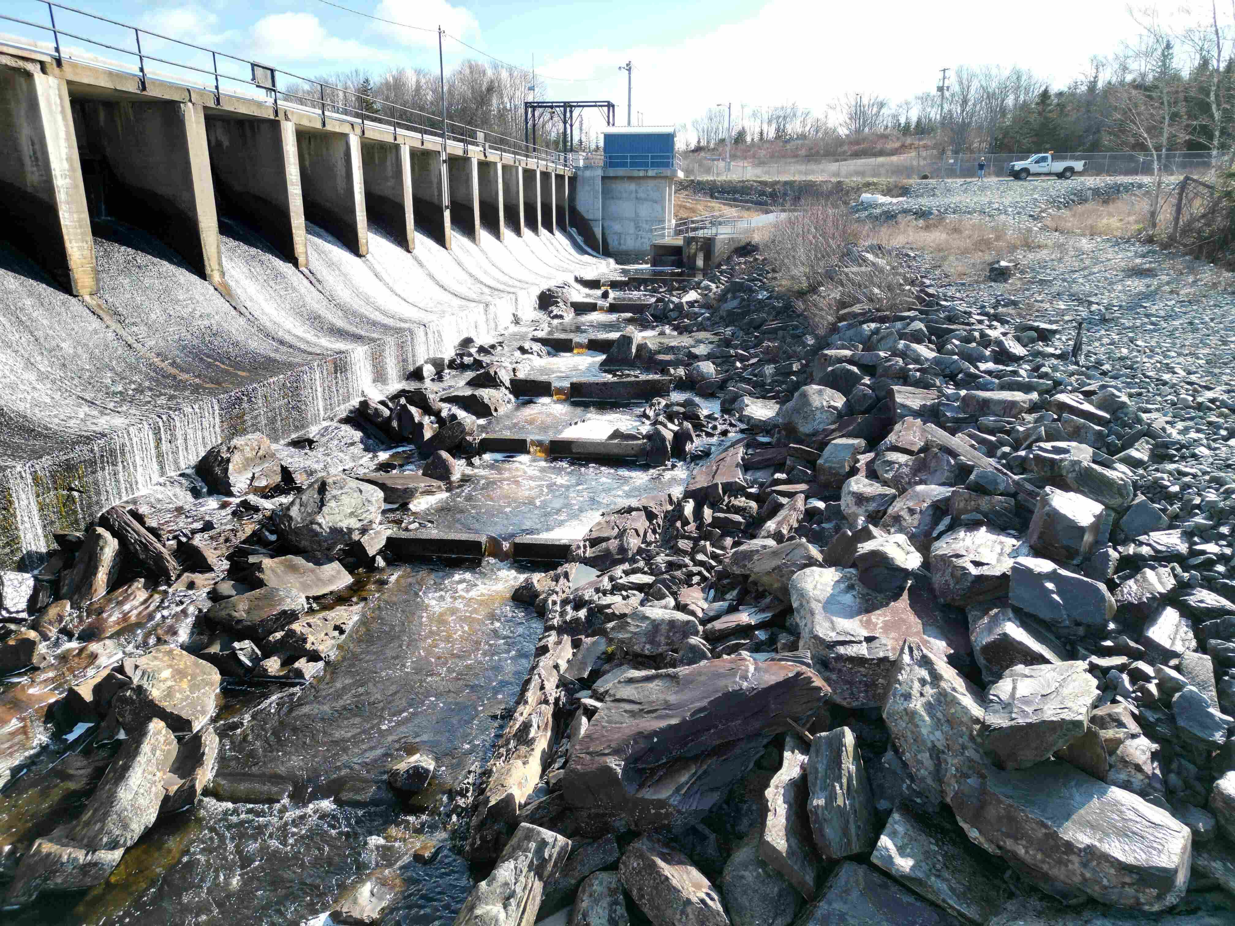 Water from the Ruth Falls Dam running over rocks.